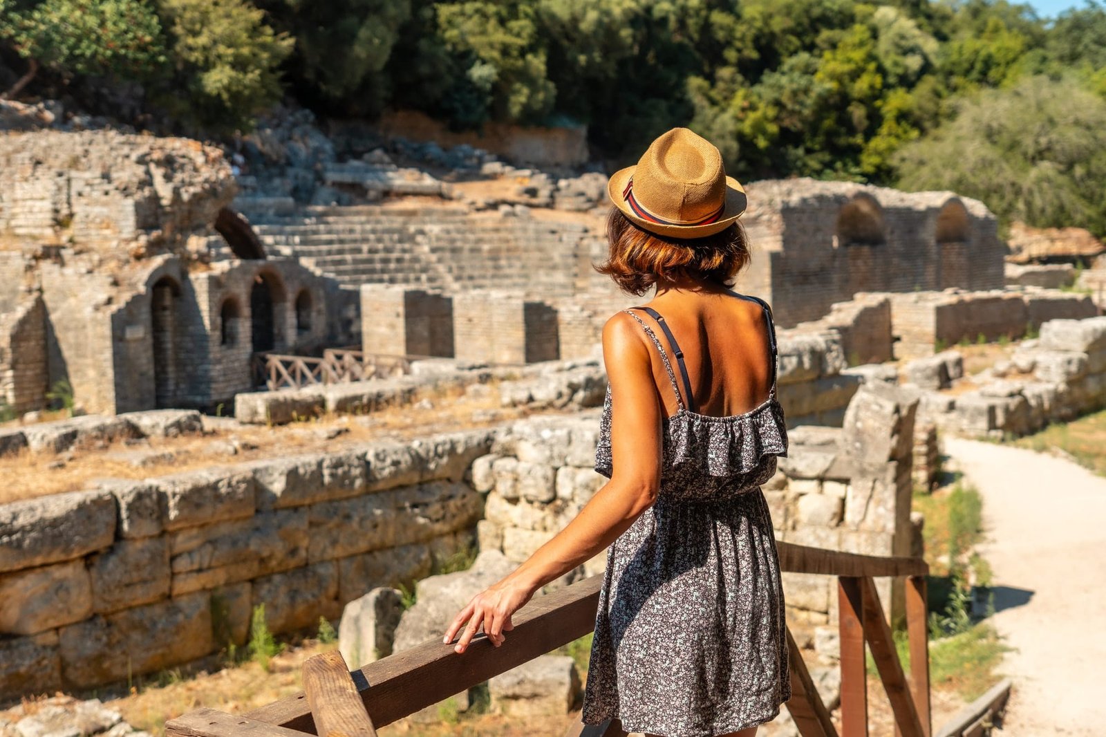 A woman visiting the archaeological ruins of the Butrint or Butrinto National Park in Albania