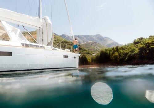 man yachting blue lagoon